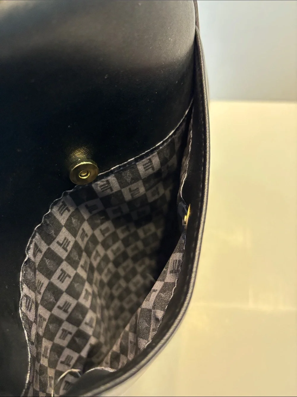 London Fog Women's Raven Tower Signature Print Backpack in Black